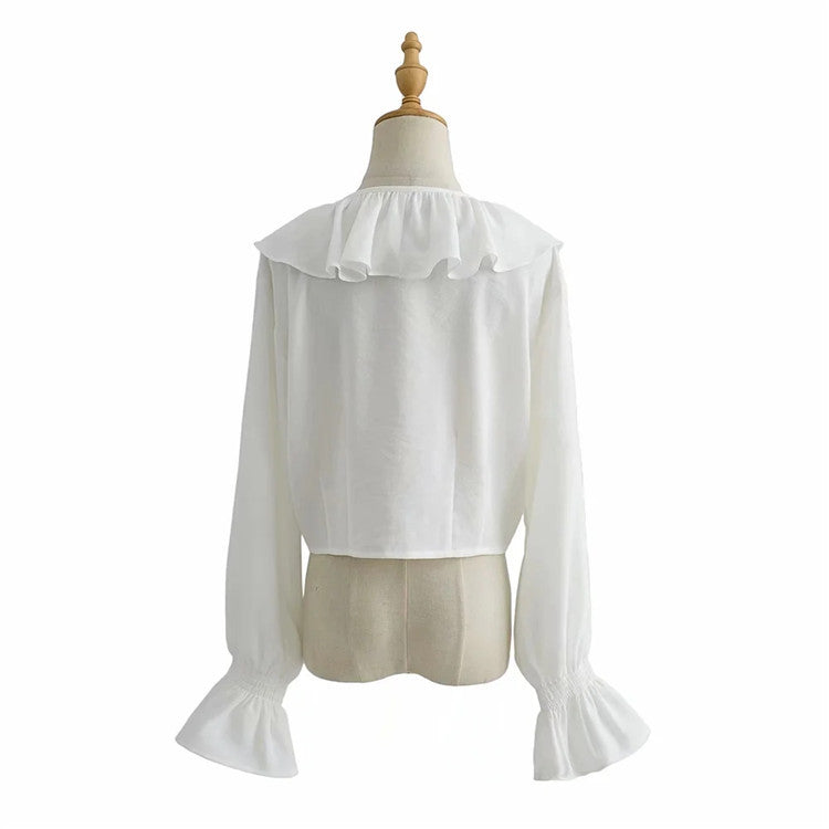 Chemise élégante en mousseline à volants et cravate